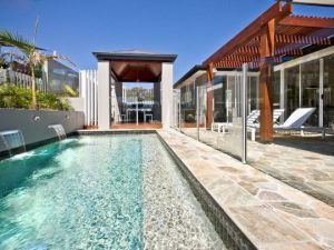 backyard with a cool glass enclosure fencing | Werribee Fencing Pros